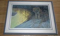 Frontal view of the framed print showing the full composition of a tiger in a snowy landscape.