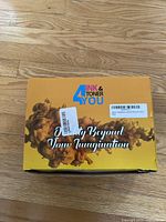 Outer packaging of the ink cartridges with 'Ink & Toner 4 You' branding and slogan 'Quality Beyond Your Imagination'.