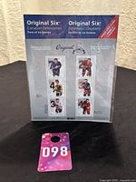 Sealed pane of six Canadian NHL Original Six defencemen postage stamps from 2014 with blue and silver themed presentation sheet.