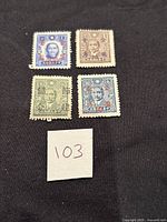 Four unused Dr. Sun Yat-Sen Taiwan stamps with red overprint, no gum, shown on a black background with label '103'.