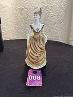 Front view of the Coalport Christabel figurine showing the detailed dress and pose