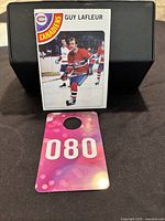 Front image of Guy Lafleur hockey trading card in Montreal Canadiens uniform skating on ice