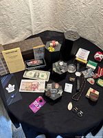 Table overview showing all items on hexagonal display risers and cloth.