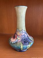 Full front view of vase showing shape and floral motif