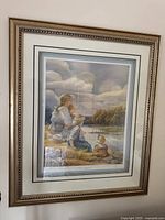 Full view of the framed lithograph depicting a lakeside scene titled 'The Regatta' by Trisha Romance.