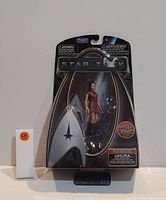 Front view of boxed Star Trek collectible figure #68 Uhura by Playmates, sealed in original packaging.