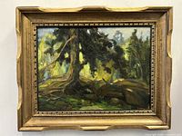 Frontal photo of the framed oil painting showing forest landscape and signature.
