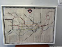 Full view of plexi framed London Underground map poster, showing the entire tube lines and stations.