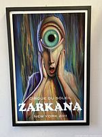 Front view of the framed Zarkana poster showing full artwork and frame.