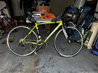 Side view of the Trek Alpha 2.1 road bike showing frame, wheels, and components