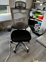 Front view showing full chair profile and headrest