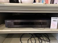 Front view of black Oppo Blu-ray player with power LED lit and power button visible