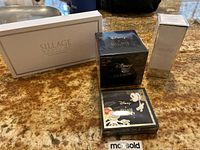 Four boxed House of Sillage fragrance products including two from Disney collaboration.