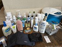 Full view of all creams, lotions, cosmetics bags, Vicks humidifier and Sunbeam blow dryer