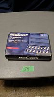 Closed outer packaging box showing branding and product image for Mastercraft 3/8 inch drive 14-piece socket set.