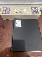 Box labeled 1991 Donruss Series I + II, numbered 1-700 with black binder marked #2