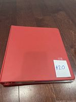 Red binder used to store the card set, labeled #20