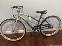 Side view of the CCM Navigator Pro Series cruiser bike displaying full frame and tires.