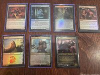 Top row of Magic the Gathering cards including Clockwork Prodigy, Genju of the Falls, Opposition, Galvanic Lightning, Mountain land card and other various creature cards.