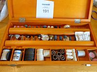 Open Mastercraft wooden case showing full assortment of rotary drill accessories in compartments