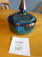 Full view of covered candy dish with finial lid