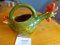 Full view right side showing entire watering can