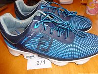 Side view of both FootJoy HyperFlex shoes showing uppers and laces