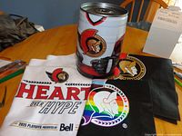 Group shot showing mini keg, two tote bags and rally towel