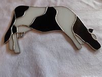 Front view of stained glass cow