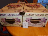 Two floral storage boxes showing overall size and design