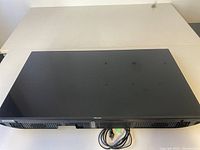 Front view of 40 inch Hisense TV screen, showing intact flat black display and attached power cord.