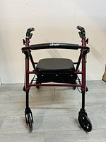 Front view showing padded seat with Drive brand logo on rear handle.