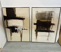 Pair of abstract acrylic paintings on canvas by Marianne Dam Hansen, 1970, framed, side-by-side leaning against wall.