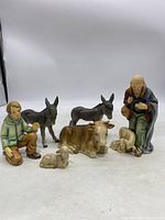 Group shot showing all six figurines from the lot.