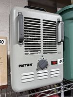 Front view of Patton heater showing brand name, air vents, and control knob.