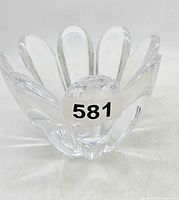 Front view of Orrefors clear crystal tulip-shaped bowl with smooth, rounded petal design.