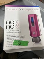 Photo of box lid showing No! No! Pro branding and product features