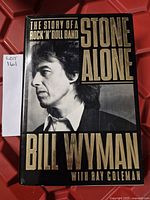 Photo of the hardcover book 'Stone Alone' by Bill Wyman with Ray Coleman showing dust jacket in good used condition.