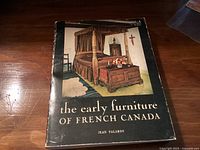 Front cover of the book showing title, author, and an image of antique furniture.