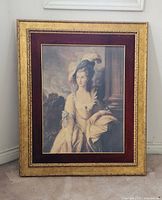 Full front view of framed portrait showing woman in 18th-century dress and feathered hat with surrounding environment.