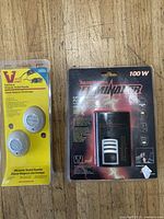 Front view of Victor PestChaser ultrasonic rodent repeller set and Motor Master Eliminator power inverter in original packaging