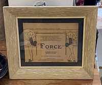 Framed vintage advertisement from 1902 for The Globe Tonic, showing the full front view of the frame and the aged paper advertisement inside.