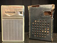 Front and back views of vintage Usha six transistor radio and its black carrying case showing wear and damage.