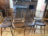 Front view of eight chairs in two rows