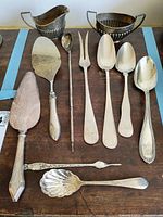 Overview of two ribbed handled bowls and all utensils laid out