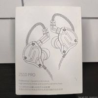 Box showing line art image of ZS10 Pro in-ear monitors and key features text