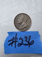 Obverse side showing portrait of King George IV with inscription.