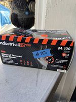 Box of industri-all PRO brand nitrile gloves, diamond textured, size M, 100 count, 8 mil thickness, labeled #173.