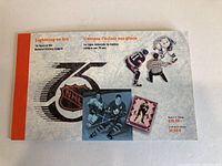 Front cover of the 1992 NHL 75th anniversary stamp collection booklet showing NHL players, referee, anniversary logo, and booklet title.