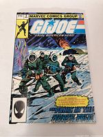 Front cover of G.I. Joe Comic Book #2 showing the title, pricing, and illustrated characters in winter gear on a snowy background.